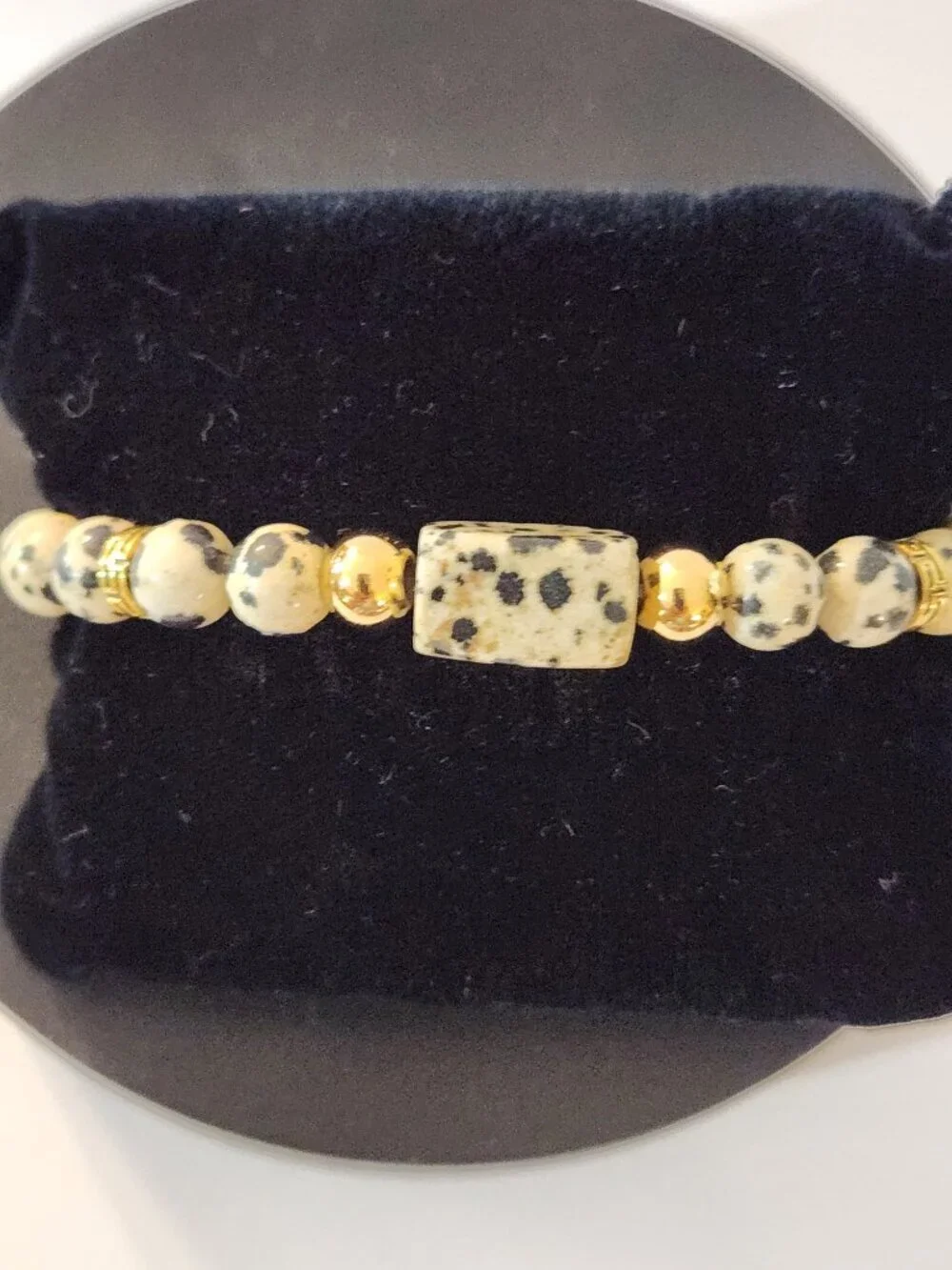 Hand Crafted Dalmatian Jasper Stretch Bracelet With Gold Accents Black Beige